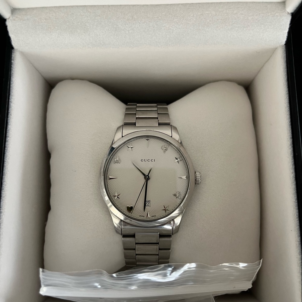 Gucci G-Timeless Quartz Silver Dial With Charms
Hour Markers Ladies Watch